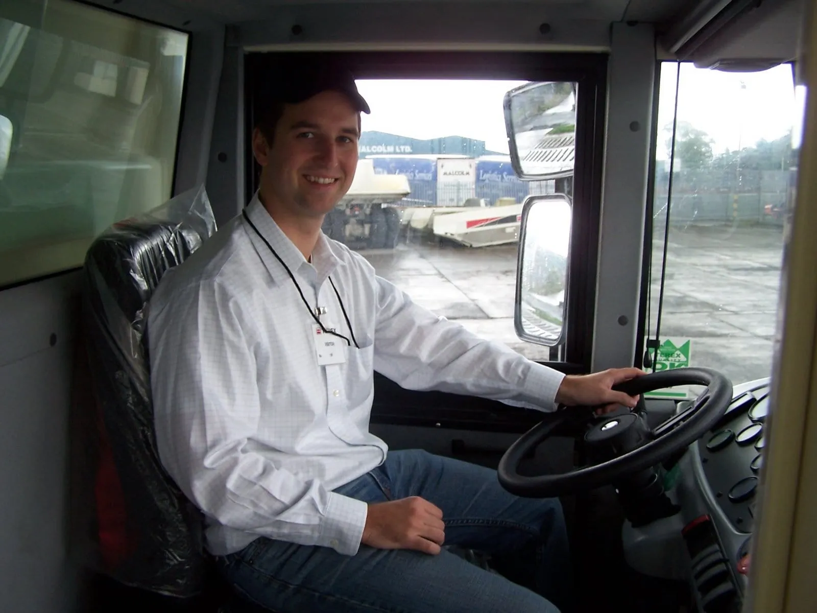 Chris at the wheel in the cab of a new haul truck